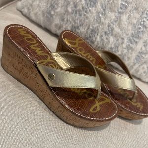 Gold platform flip flops